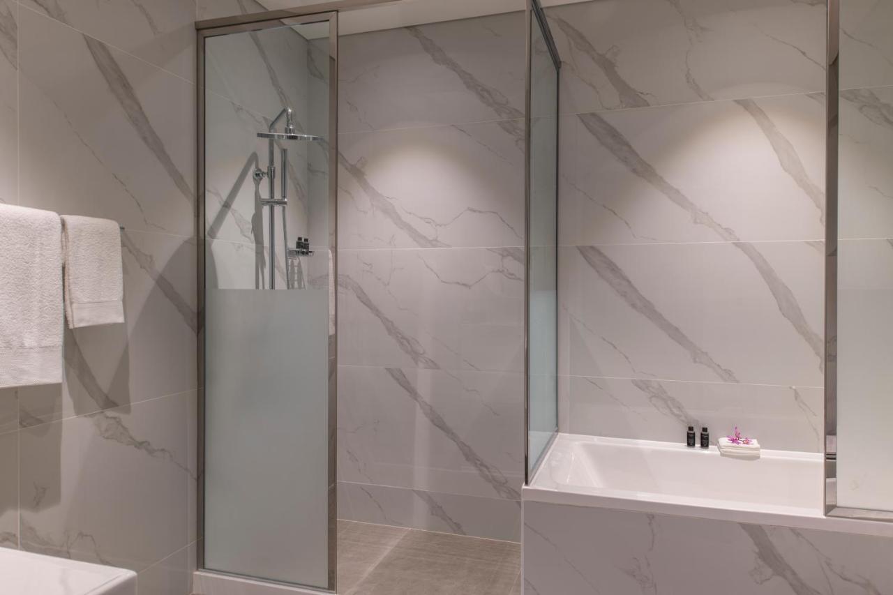 Steigenberger Residence Doha Bagian luar foto A shower enclosure