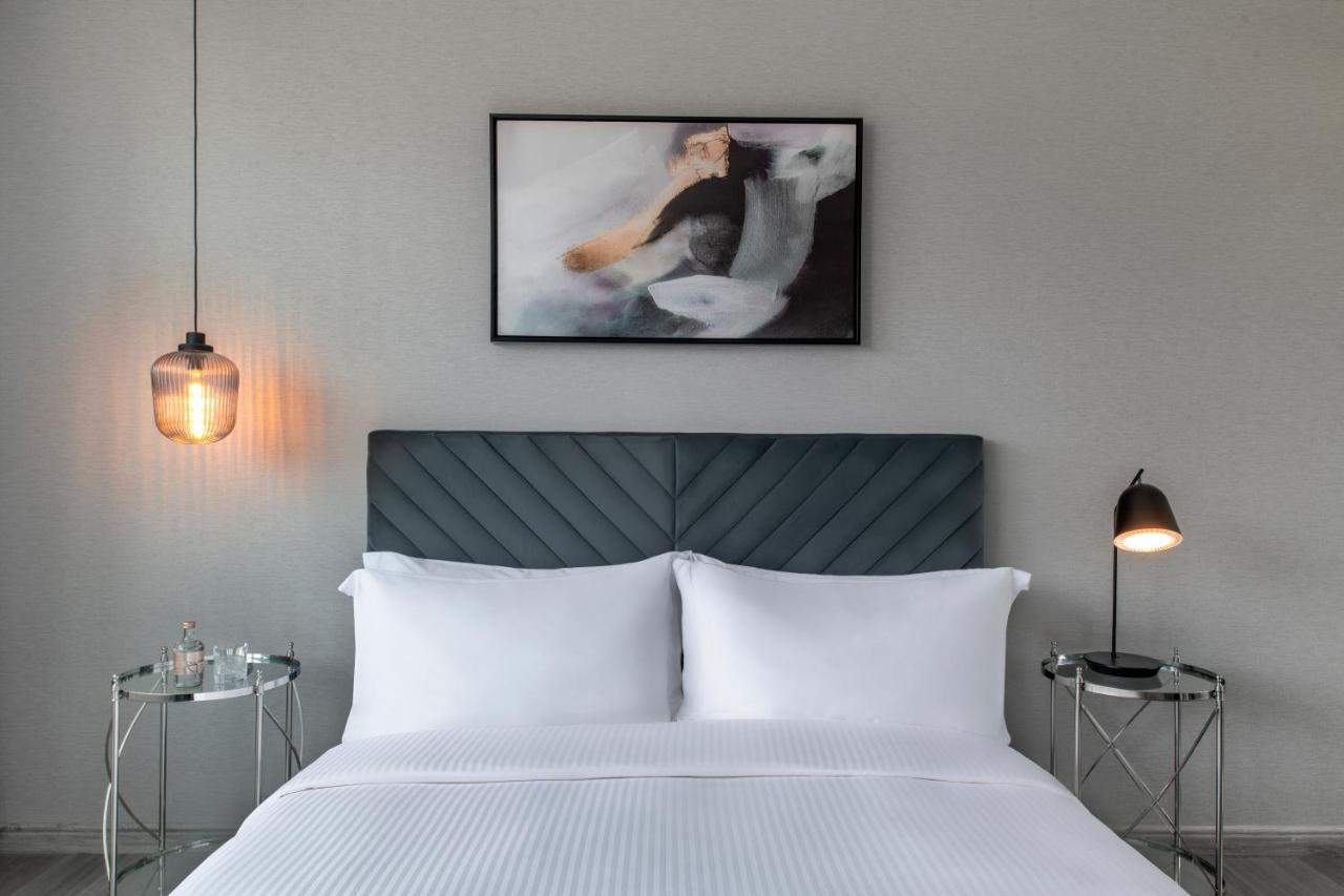 Steigenberger Residence Doha Bagian luar foto A bedroom at the hotel