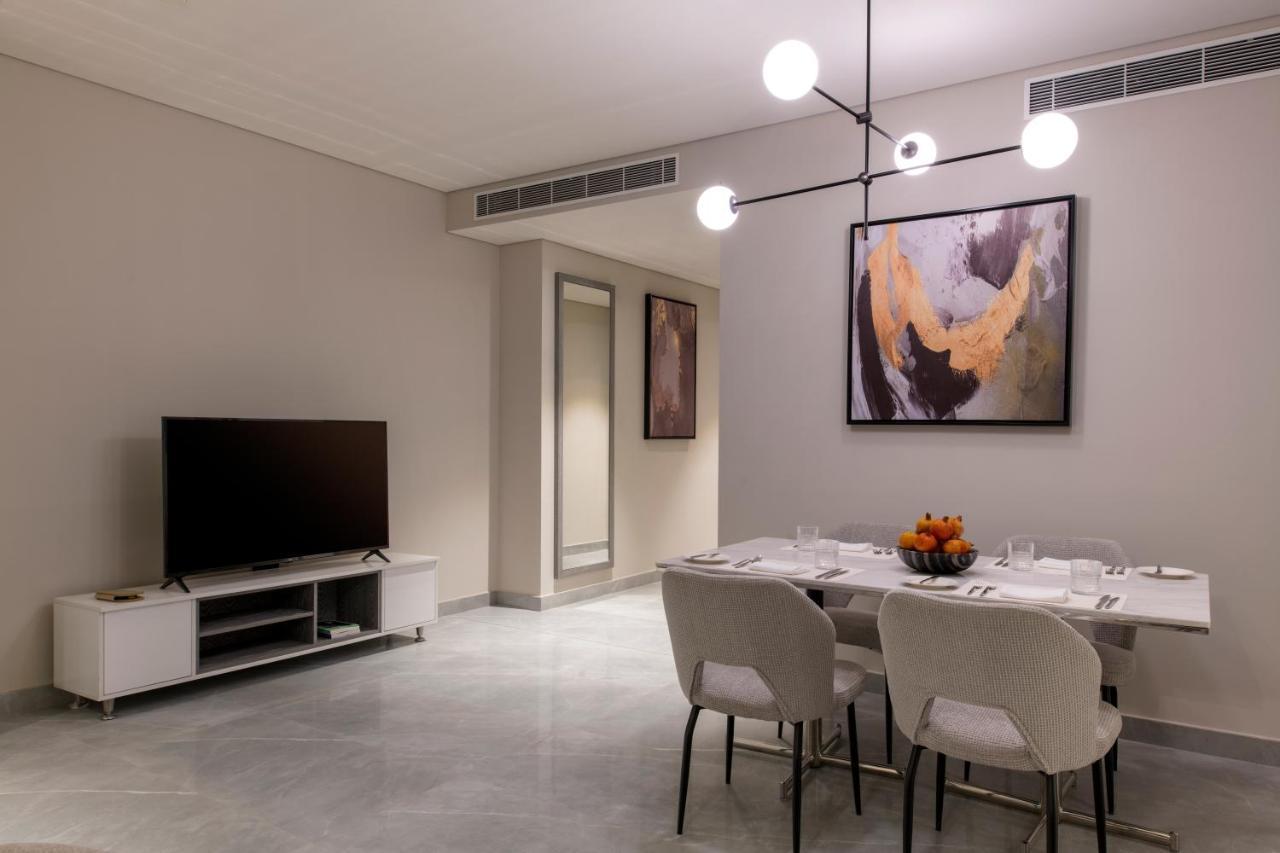Steigenberger Residence Doha Bagian luar foto A living room in a typical apartment